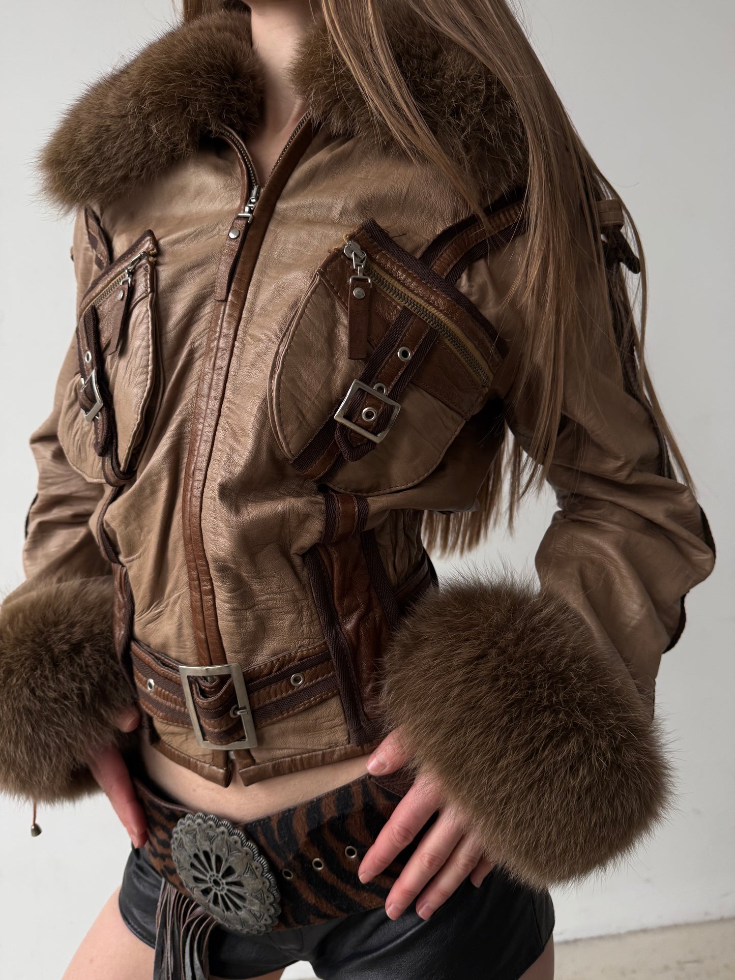 Vintage leather jacket with natural fur and utility buckle detailing TWINKLING GLOBAL