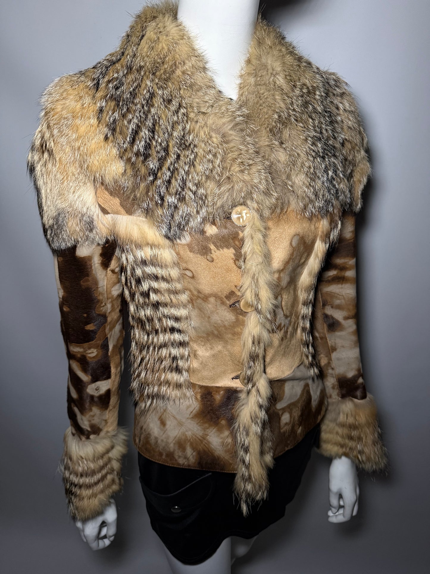 Vintage leather and natural fur patchwork jacket with sculptural silhouette