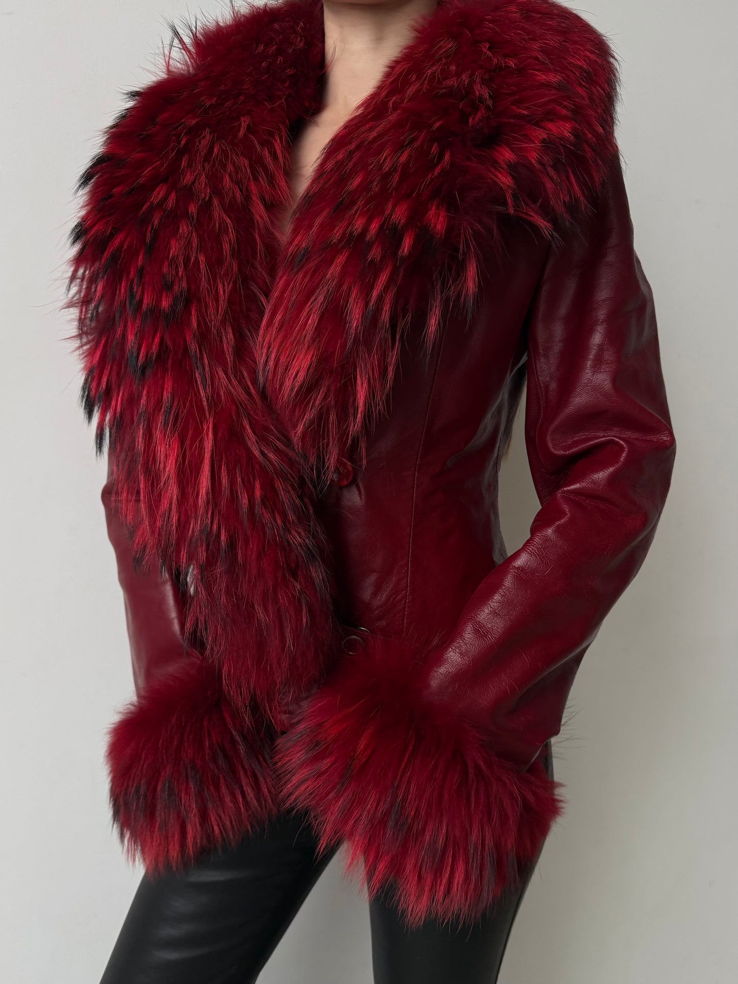 Vintage red leather jacket with luxurious natural fur details