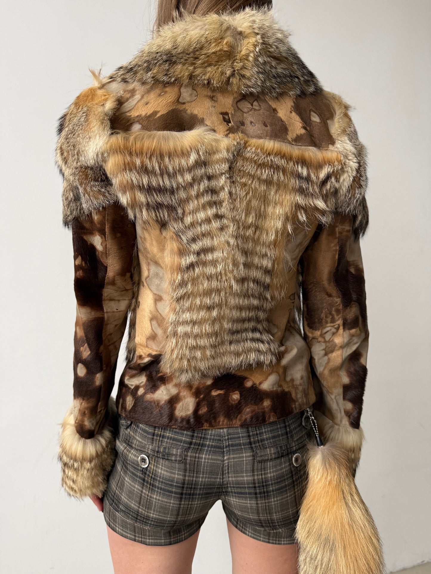 Vintage leather and natural fur patchwork jacket with sculptural silhouette