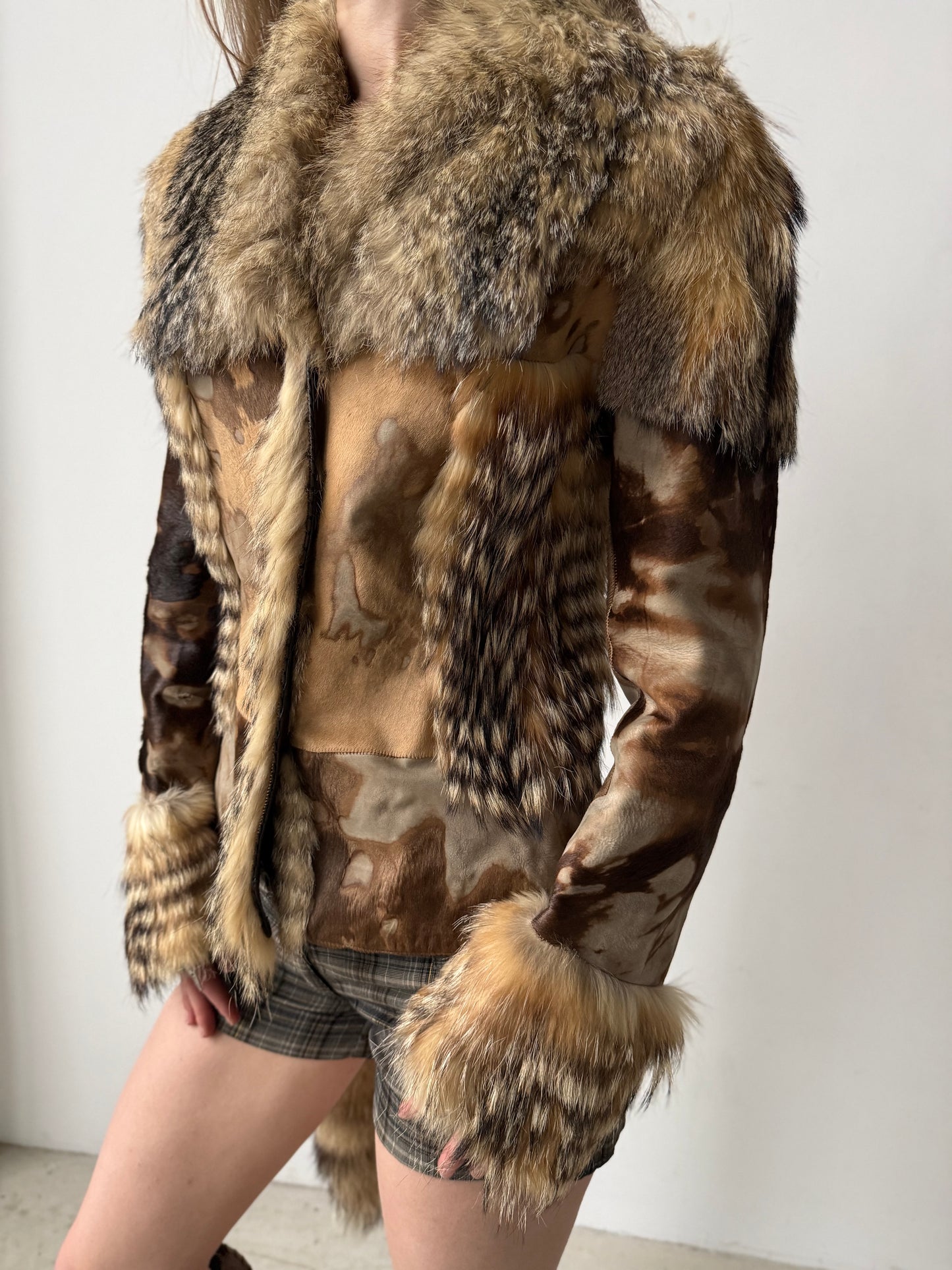 Vintage leather and natural fur patchwork jacket with sculptural silhouette