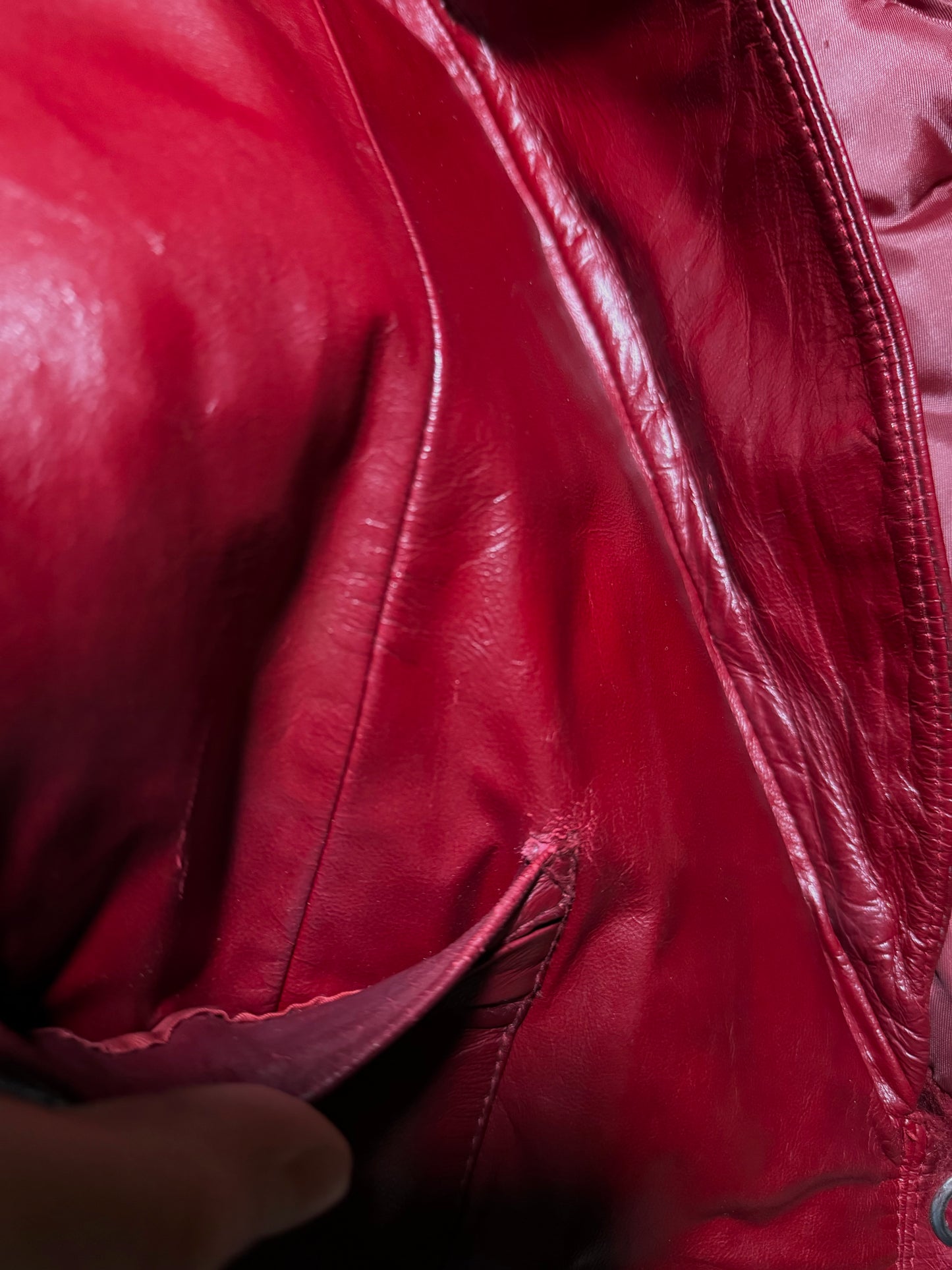 Vintage red leather jacket with luxurious natural fur details