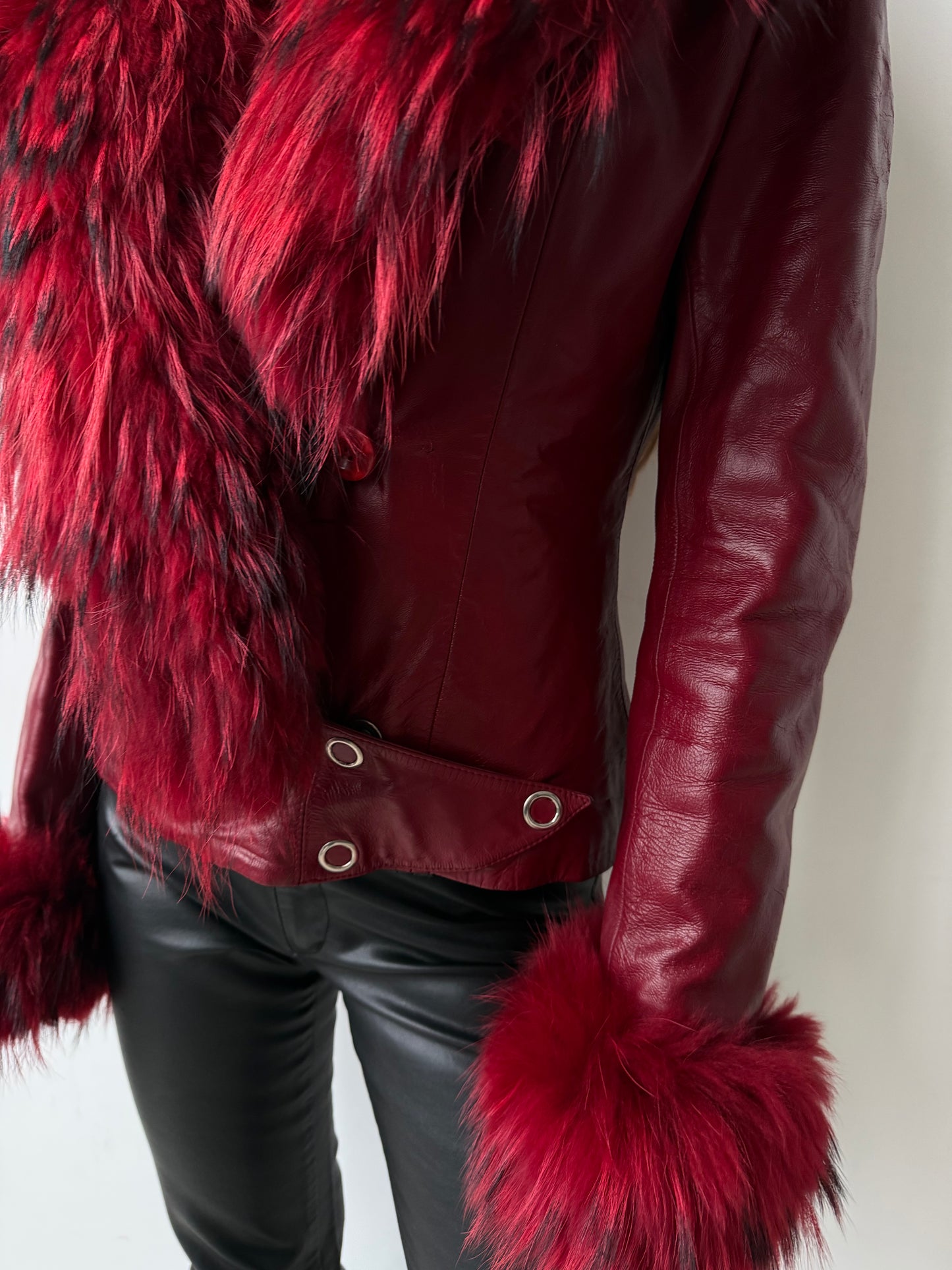 Vintage red leather jacket with luxurious natural fur details