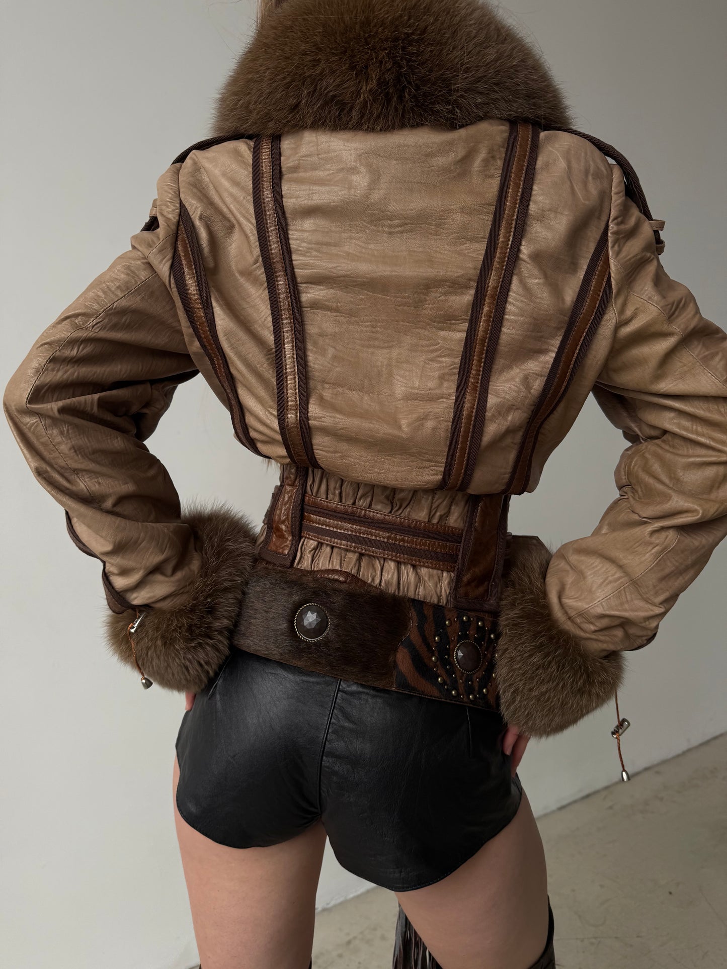 Vintage leather jacket with natural fur and utility buckle detailing TWINKLING GLOBAL
