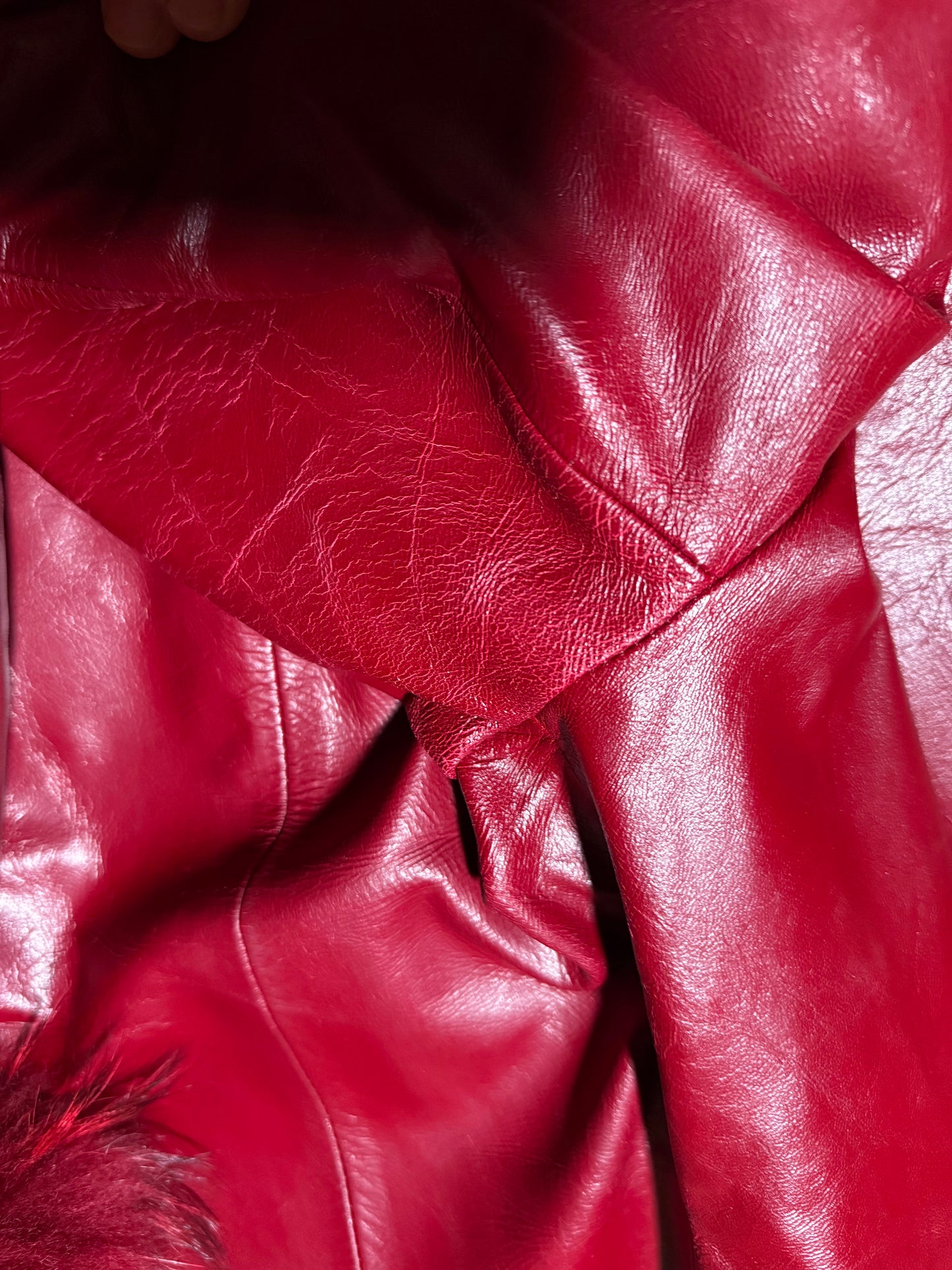 Vintage red leather jacket with luxurious natural fur details