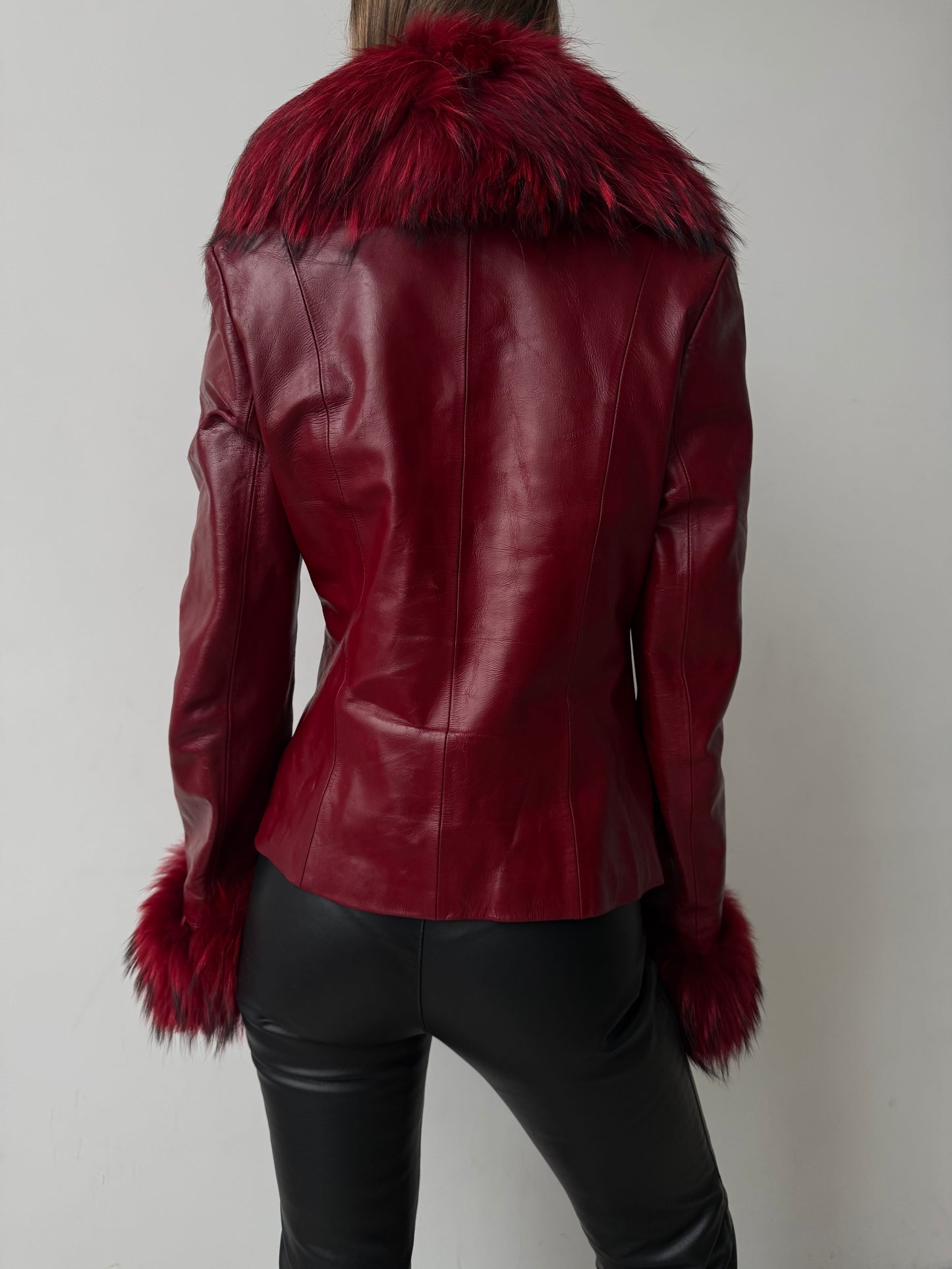 Vintage red leather jacket with luxurious natural fur details