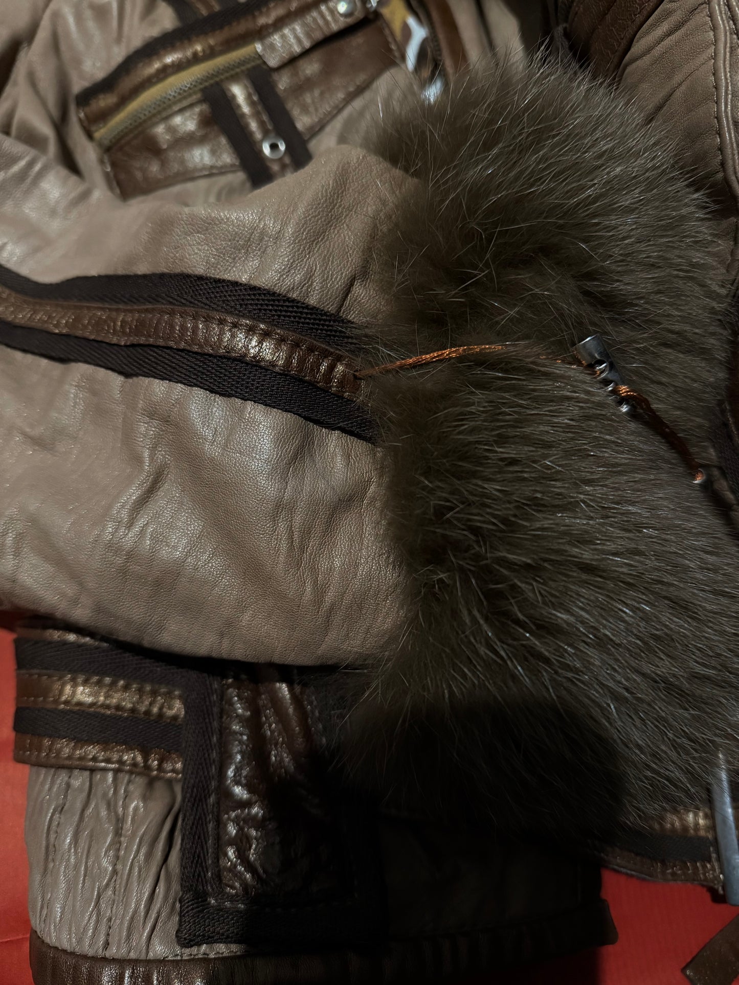 Vintage leather jacket with natural fur and utility buckle detailing TWINKLING GLOBAL