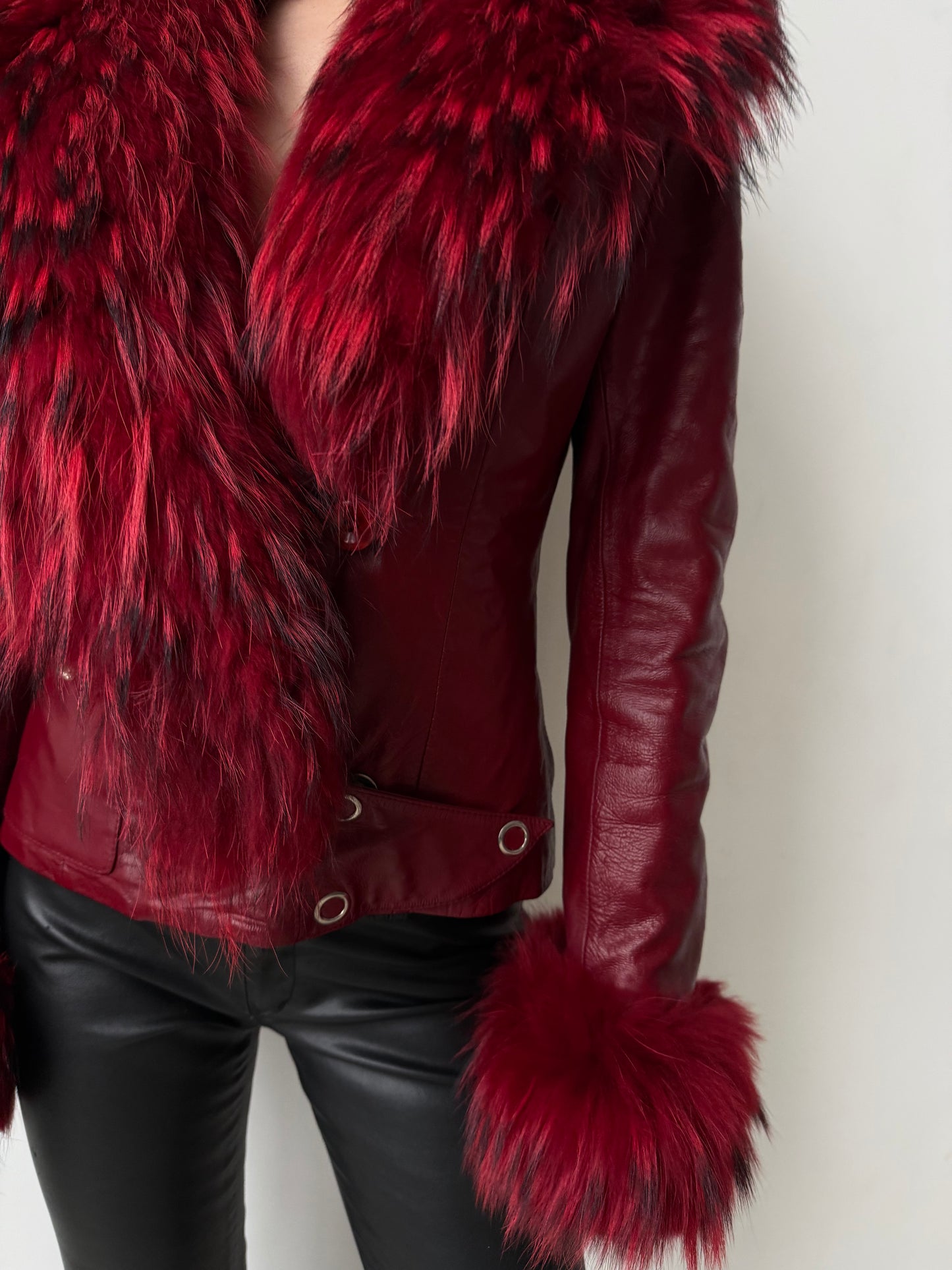 Vintage red leather jacket with luxurious natural fur details