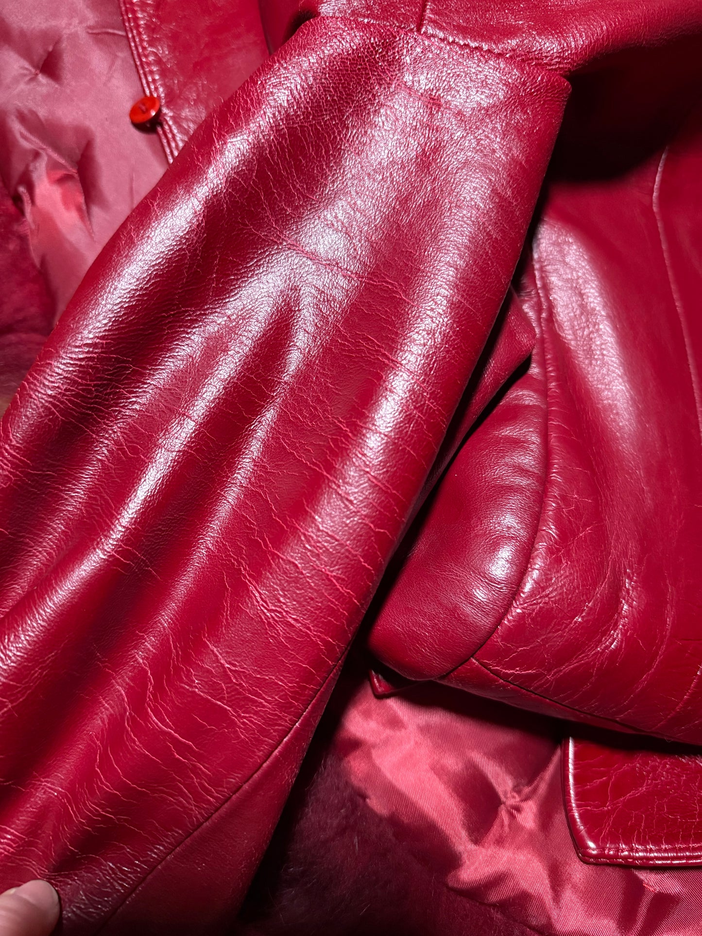 Vintage red leather jacket with luxurious natural fur details