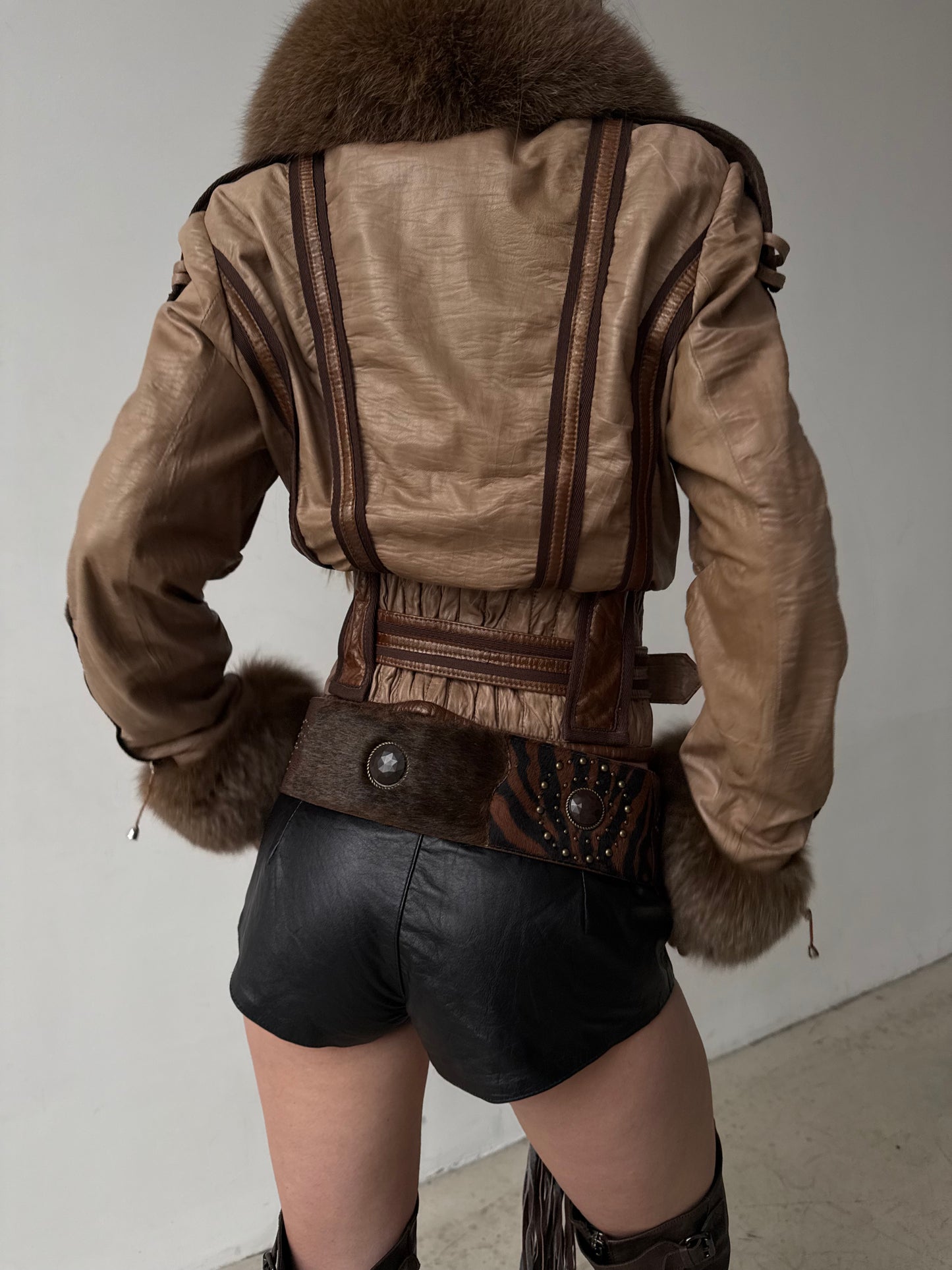 Vintage leather jacket with natural fur and utility buckle detailing TWINKLING GLOBAL