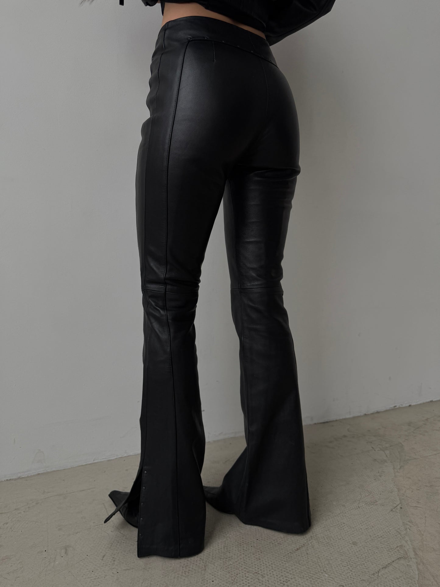 Vintage leather flared pants with slit details TWINKLING GLOBAL