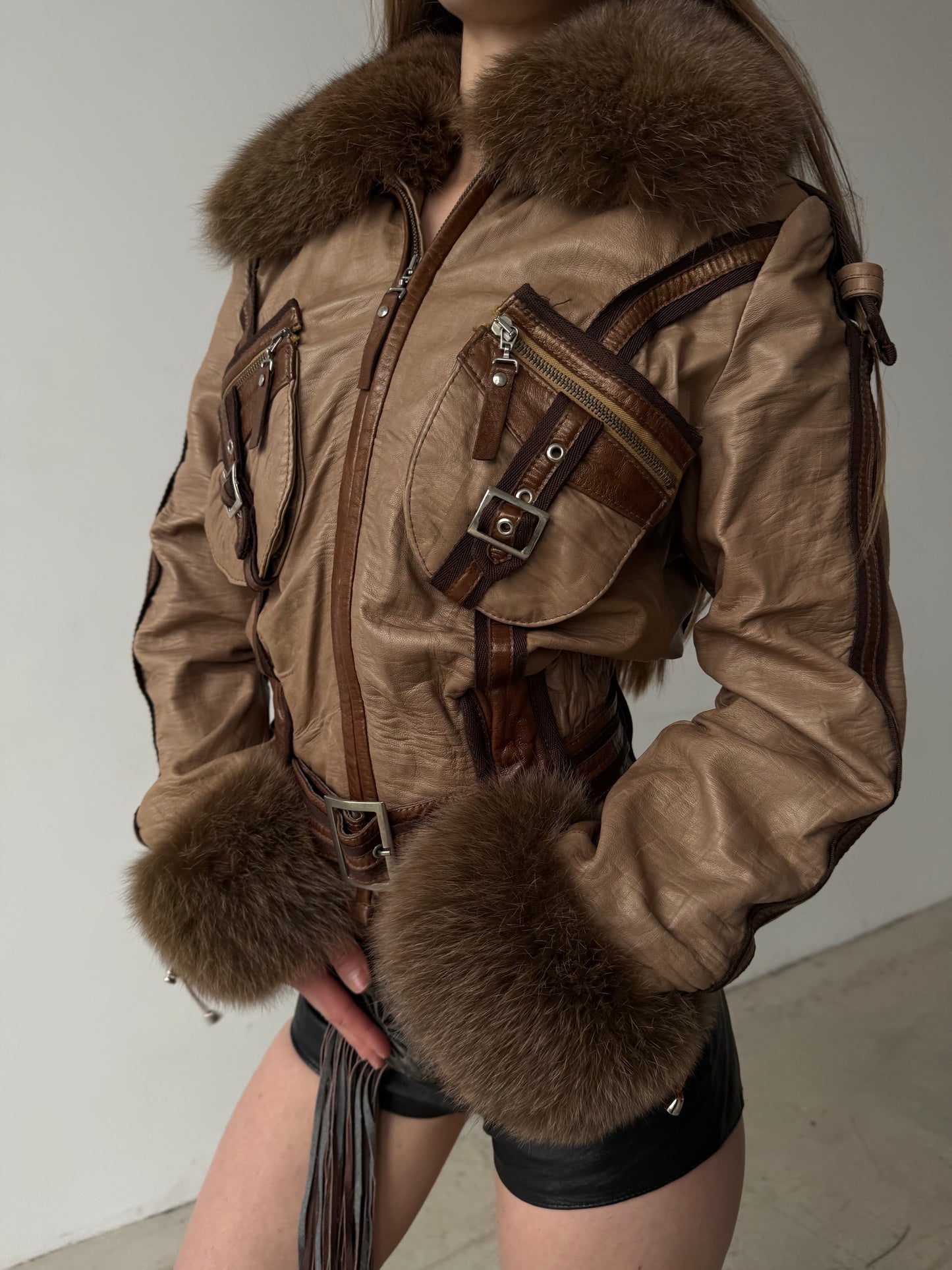 Vintage leather jacket with natural fur and utility buckle detailing TWINKLING GLOBAL