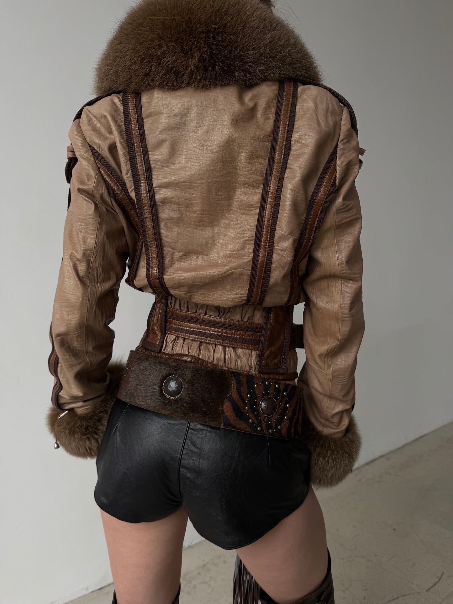 Vintage leather jacket with natural fur and utility buckle detailing TWINKLING GLOBAL