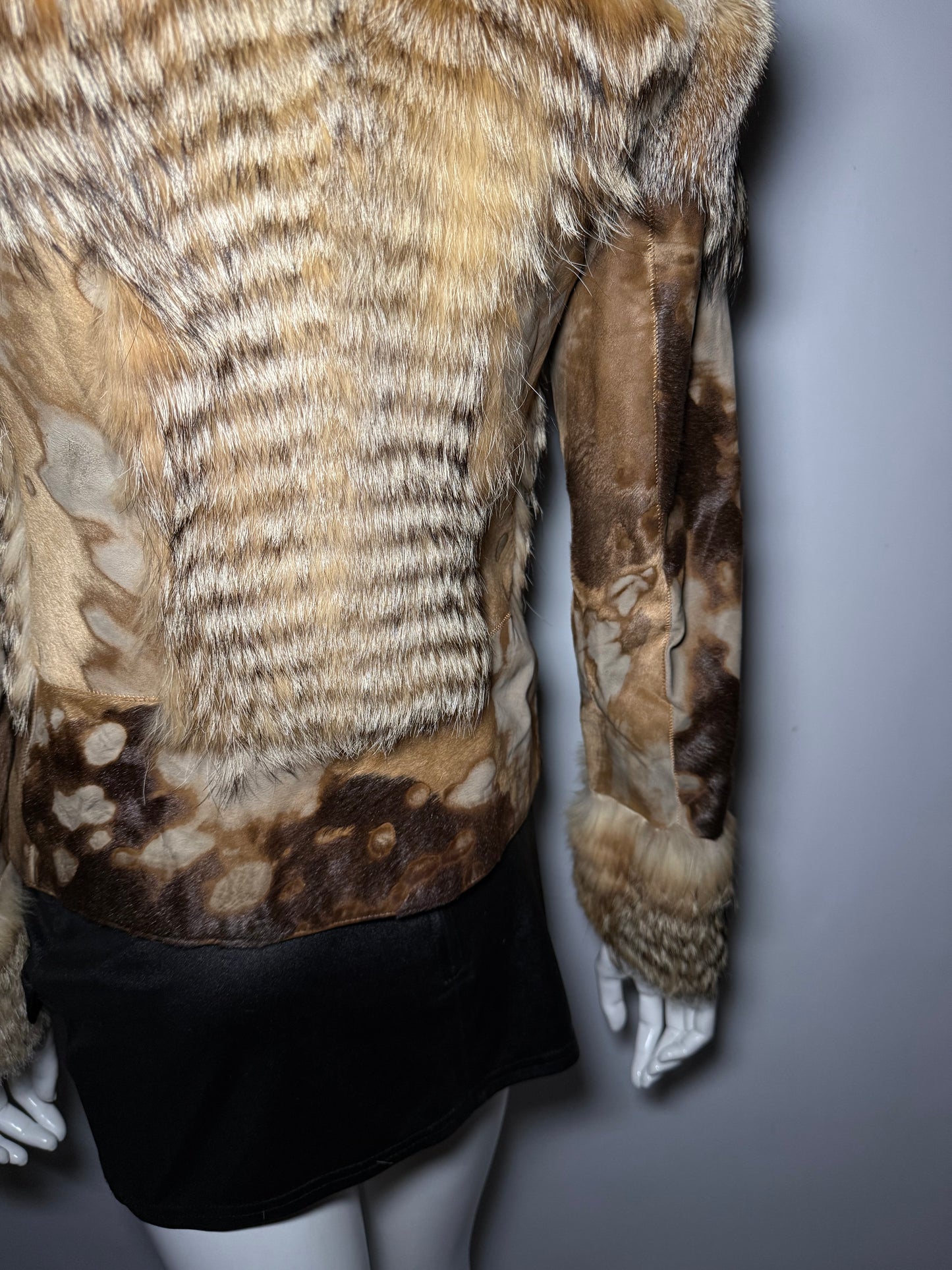Vintage leather and natural fur patchwork jacket with sculptural silhouette