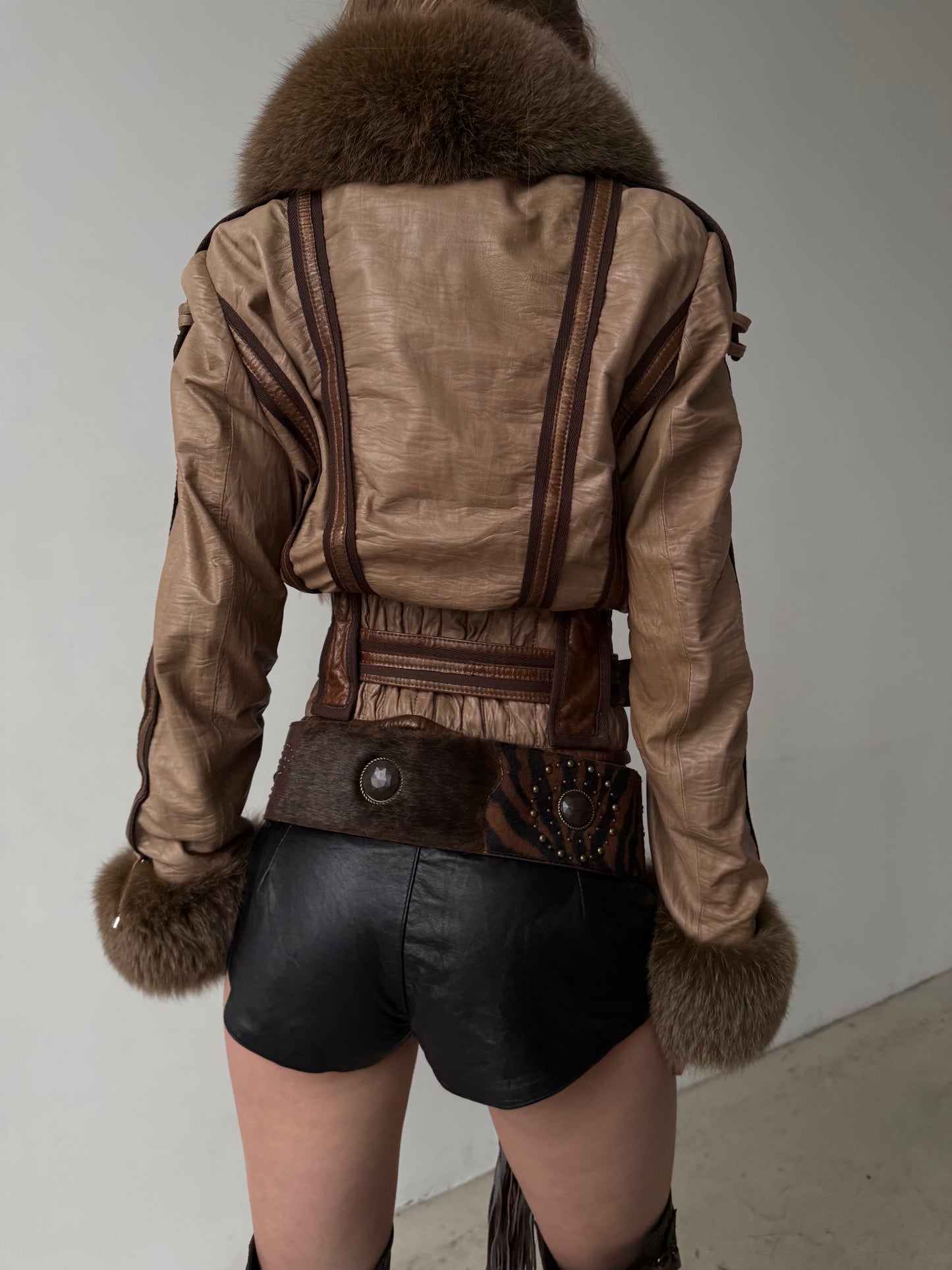 Vintage leather jacket with natural fur and utility buckle detailing TWINKLING GLOBAL