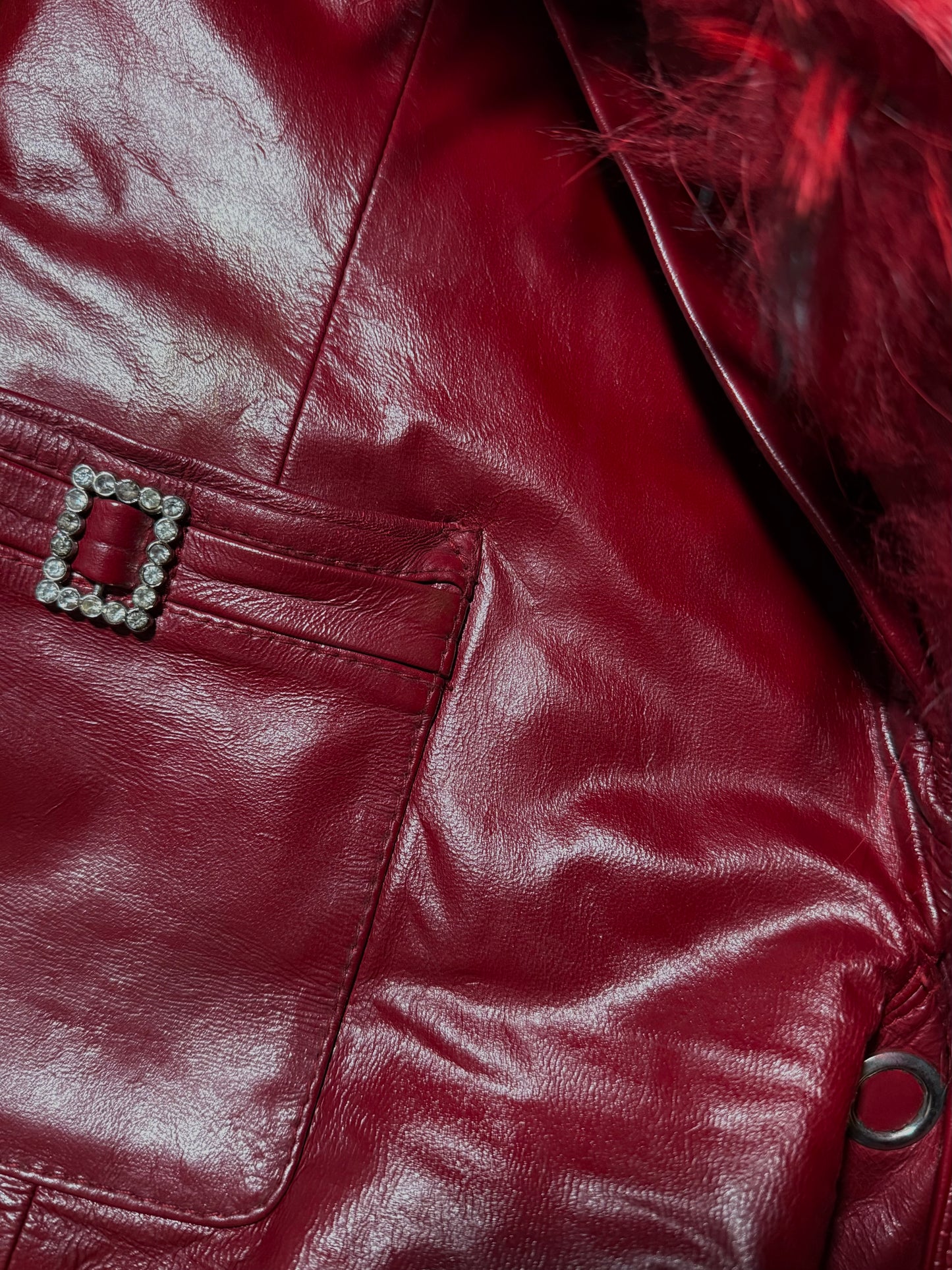 Vintage red leather jacket with luxurious natural fur details