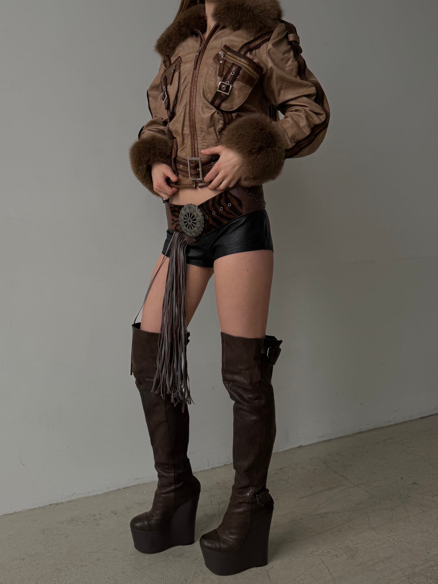 Vintage leather jacket with natural fur and utility buckle detailing TWINKLING GLOBAL