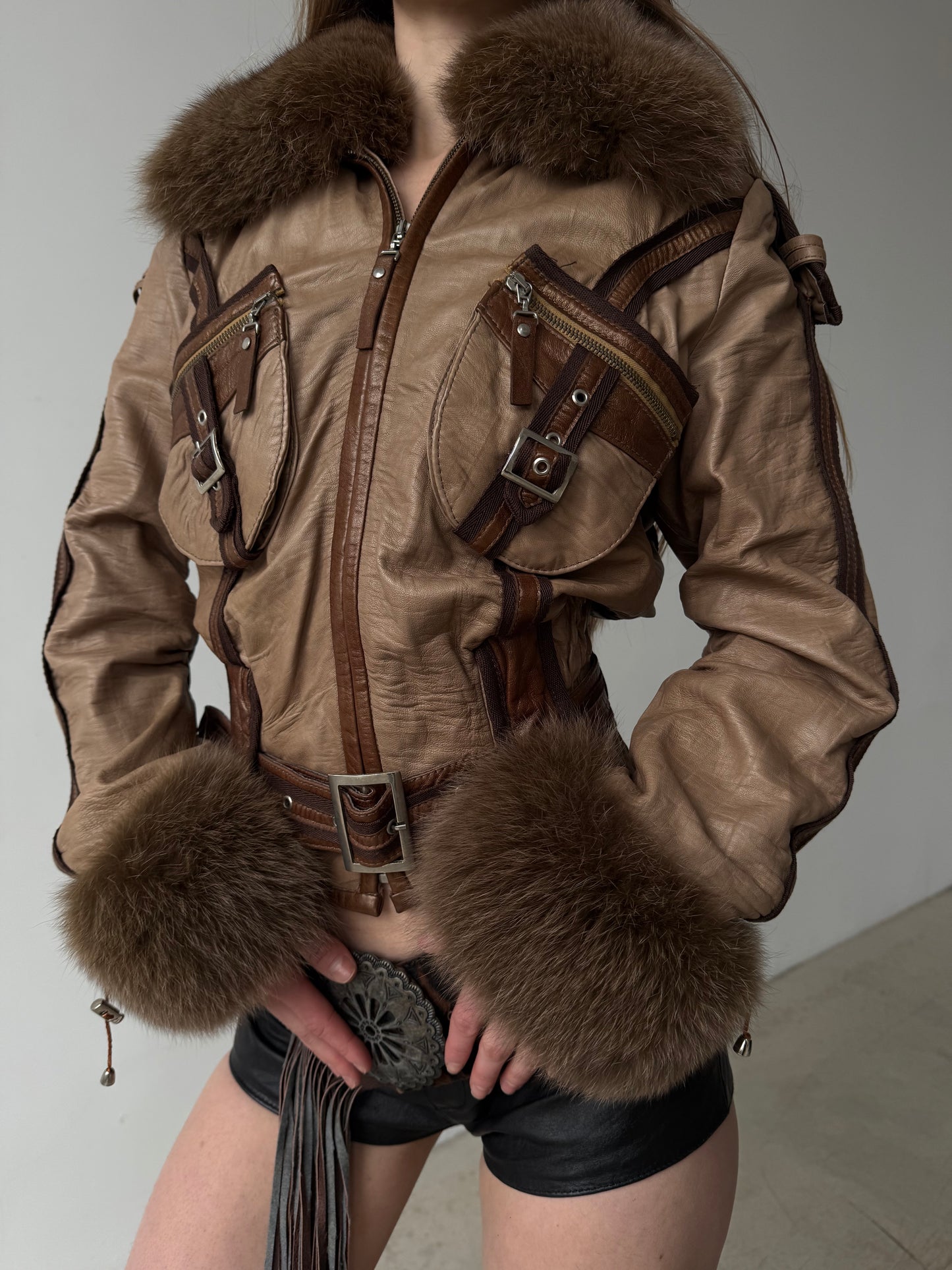 Vintage leather jacket with natural fur and utility buckle detailing TWINKLING GLOBAL