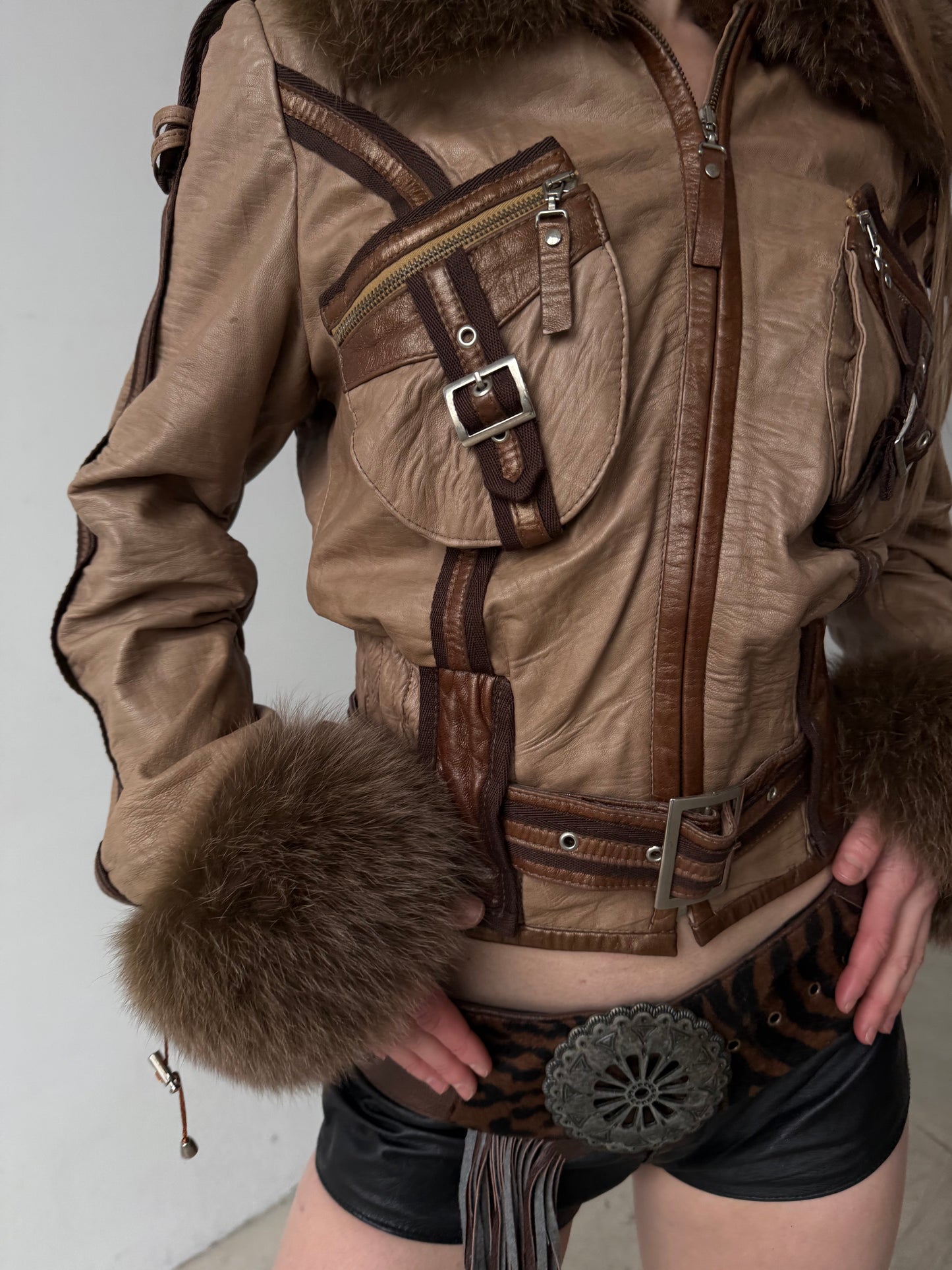 Vintage leather jacket with natural fur and utility buckle detailing TWINKLING GLOBAL