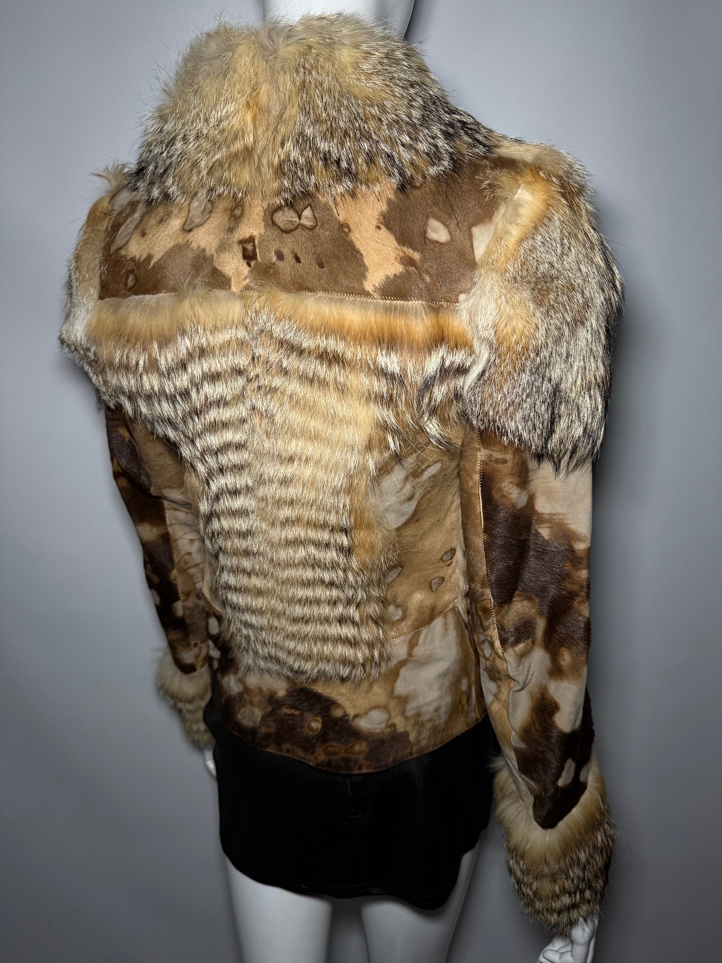 Vintage leather and natural fur patchwork jacket with sculptural silhouette