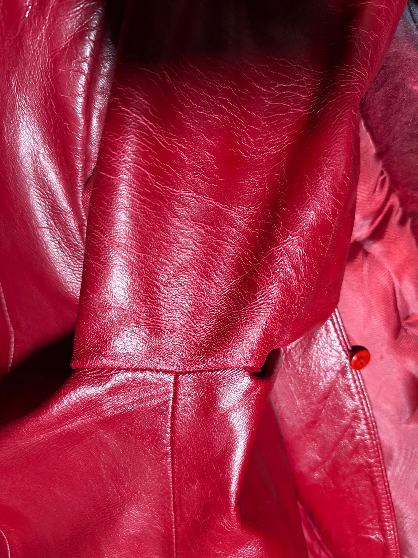 Vintage red leather jacket with luxurious natural fur details